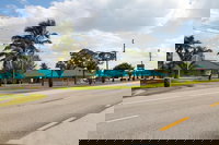 Lake Grassy Inn  Suites