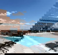 Global Luxury Suites at Woodmont Triangle North - Accommodation Rooms