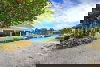 A House on Siesta Beach by Beachside Management