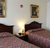 Silverland Inn  Suites - Accommodation Rooms